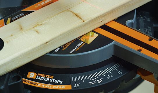 Positive stops on a mitre saw