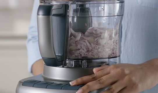 A food processor with 300 to 400 watts can handle basic chopping, slicing and shredding.