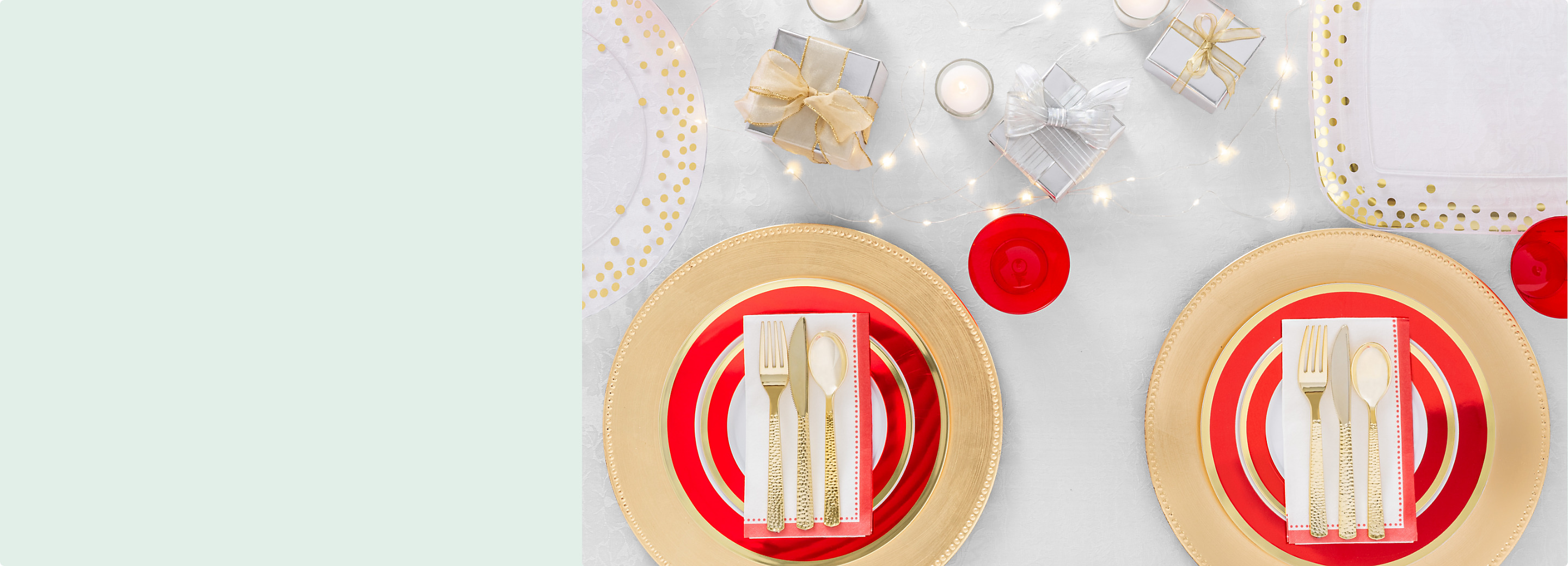 A tabletop set with a variety of white, gold and red tableware including premium plastic charger plates, metallic polka dots platters.