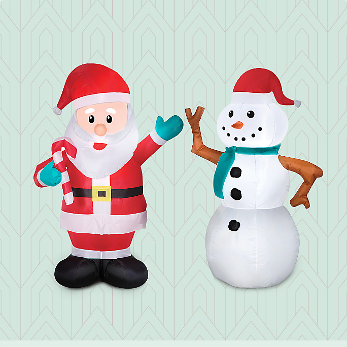 An inflatable Santa Christmas decoration and an inflatable snowman Christmas decoration.