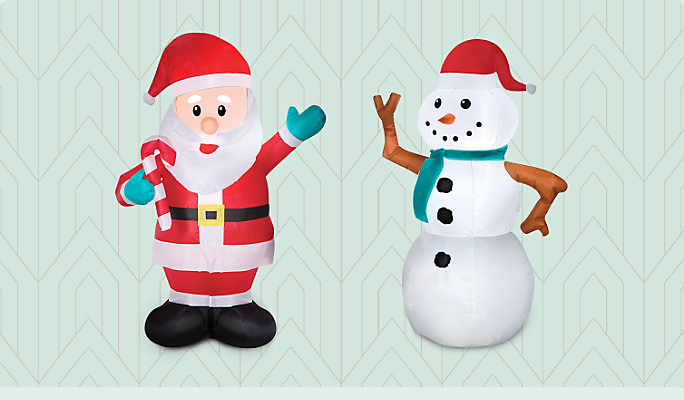 An inflatable Santa Christmas decoration and an inflatable snowman Christmas decoration.