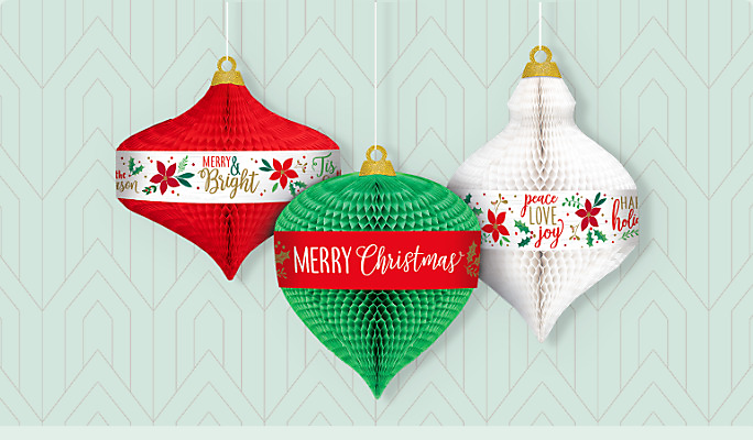 Three red, green and white Christmas ornament shaped honeycomb hanging decorations with holiday phrase prints. 
