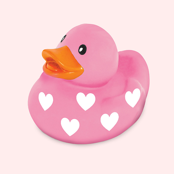 A Valentine&#39;s Day pink rubber duck with a white heart print.