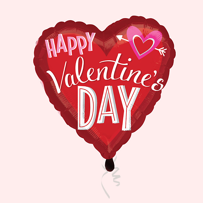 A red heart-shaped Happy Valentine&#39;s Day foil balloon.