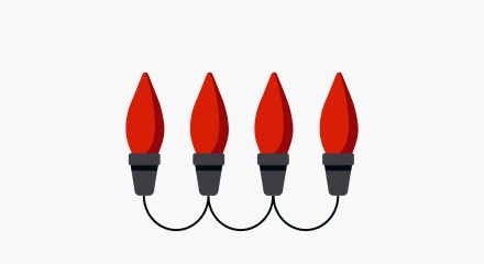 Four red C6-style Christmas light bulbs connected by a black wire.
